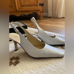 White leather sling backs